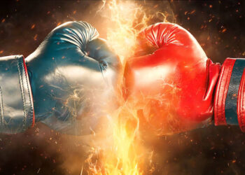 Zwei Boxhandschuhe im Kampf