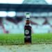 Foto einer Fritz-Kola-Flasche im Stadion